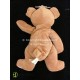 Doudou peluche ours marron motif croix NICOTOY